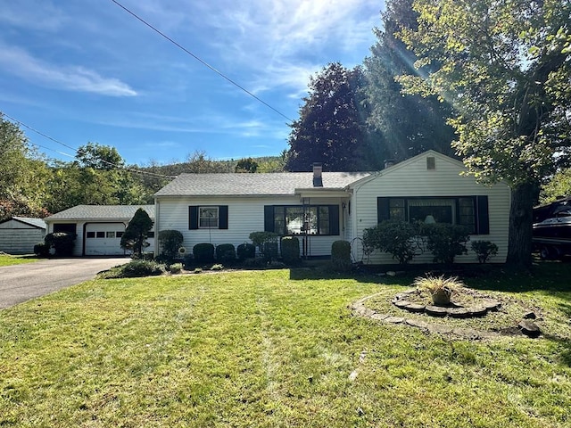 ranch-style home with a garage and a front lawn