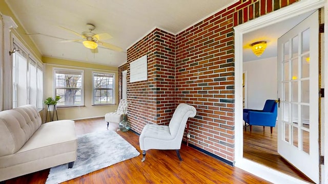 sunroom / solarium with ceiling fan