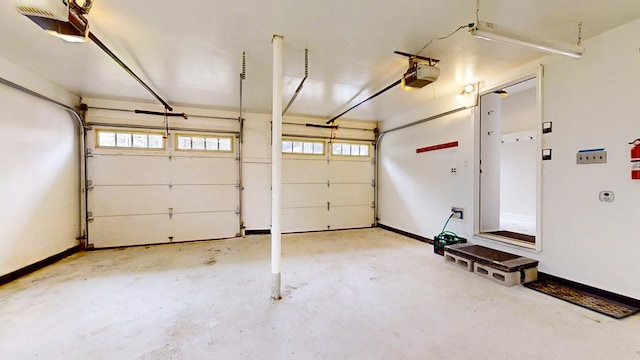 garage featuring a garage door opener