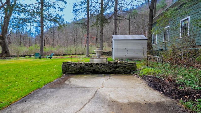 view of patio / terrace with a shed