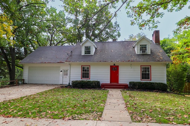 cape cod home with a front lawn and a garage