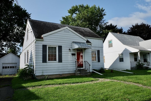 view of front facade with a front lawn and a garage