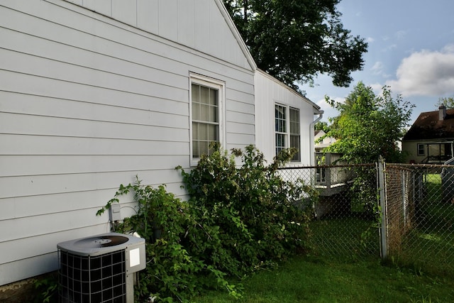 view of home's exterior with central AC unit