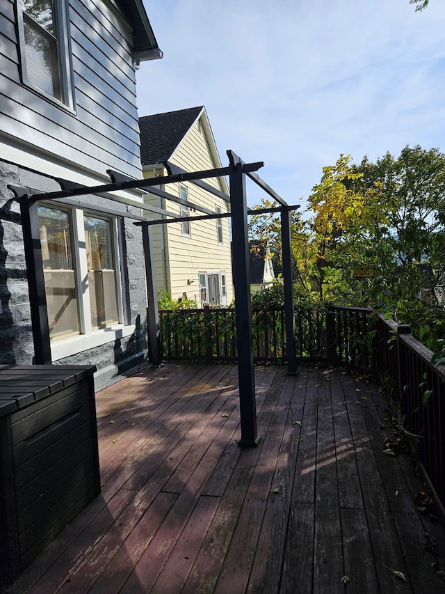 wooden terrace featuring a pergola