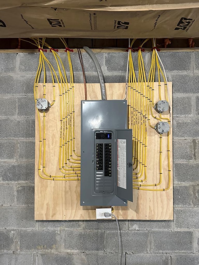 utility room featuring electric panel