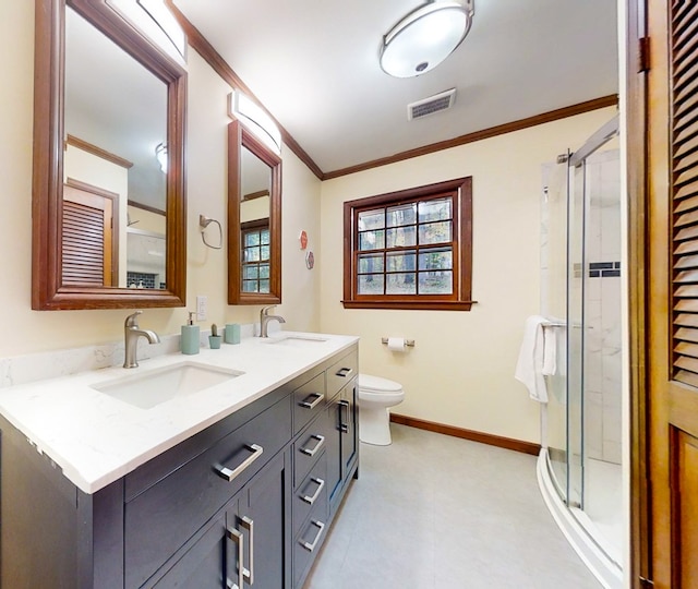 bathroom with vanity, toilet, ornamental molding, and walk in shower