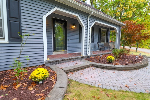 entrance to property with covered porch