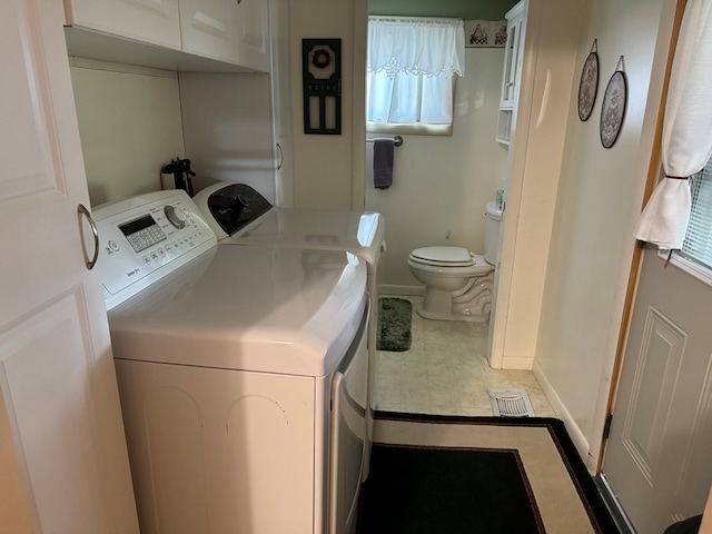 laundry area with washer and clothes dryer