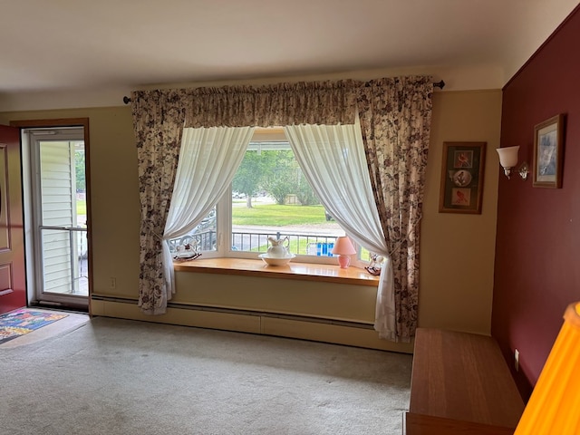 interior space featuring carpet flooring and a baseboard radiator