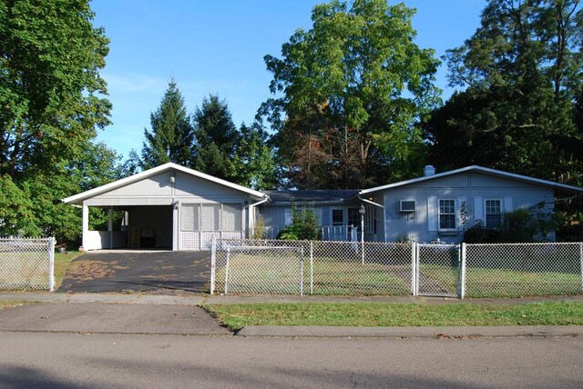 single story home with a carport