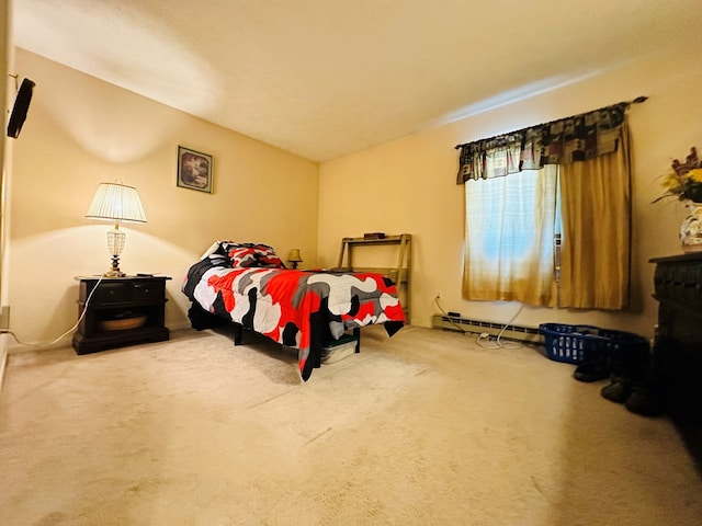 carpeted bedroom featuring a baseboard heating unit