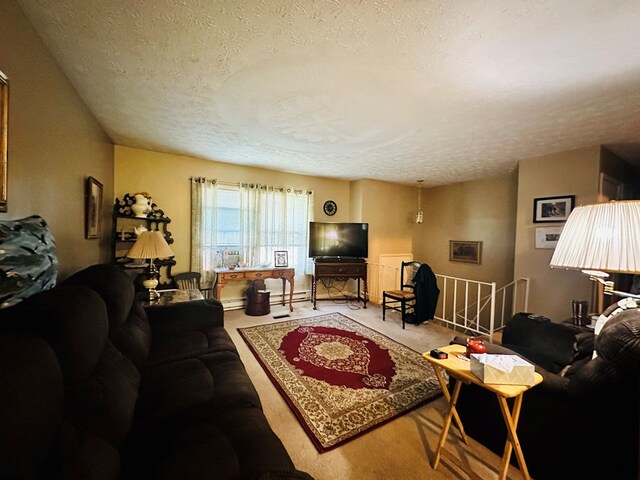 living room featuring a textured ceiling and a baseboard heating unit