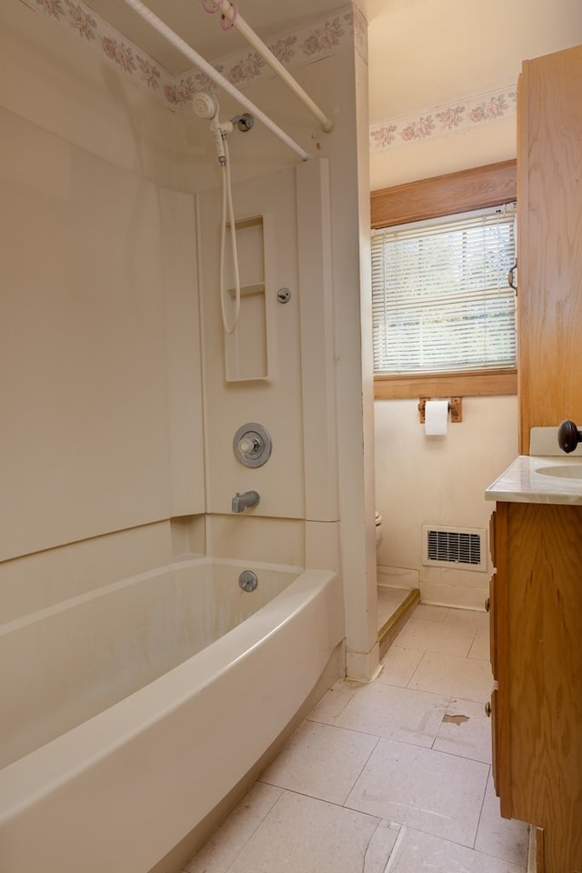 full bathroom with tile patterned flooring, vanity, toilet, and shower / bathtub combination