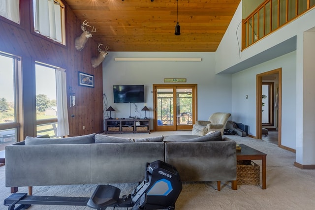 living room featuring light carpet, high vaulted ceiling, and wooden ceiling