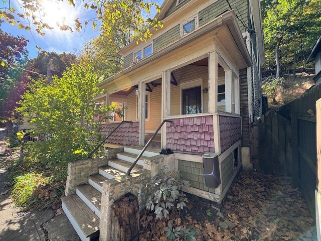 doorway to property featuring a porch