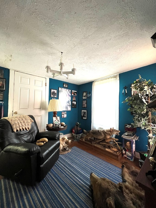 living room with a textured ceiling