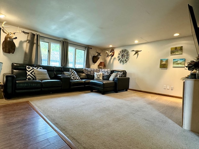 living room with light hardwood / wood-style flooring