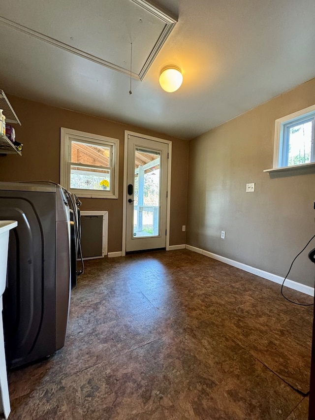 clothes washing area featuring washer / clothes dryer