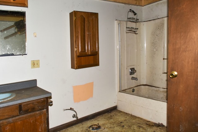 bathroom featuring shower / washtub combination and vanity