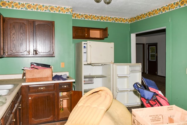 kitchen with a textured ceiling