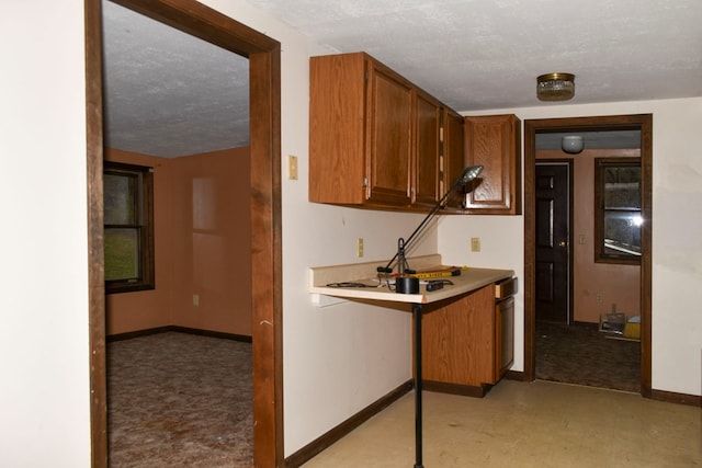 kitchen with a textured ceiling