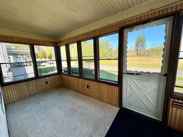 unfurnished sunroom with a healthy amount of sunlight