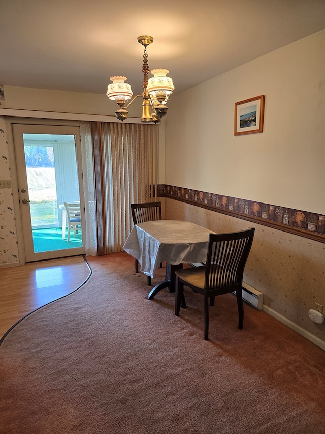 dining room featuring a chandelier