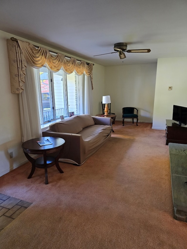 living room with carpet flooring and ceiling fan