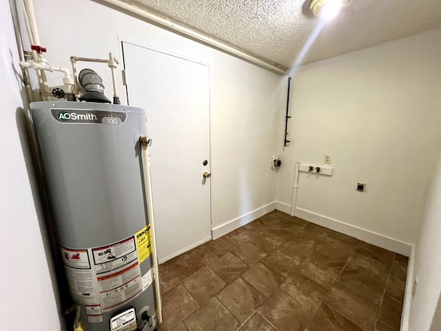 utility room featuring water heater