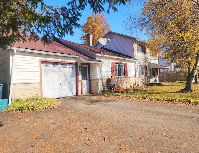 front facade with a garage