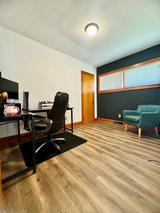 office area with hardwood / wood-style flooring