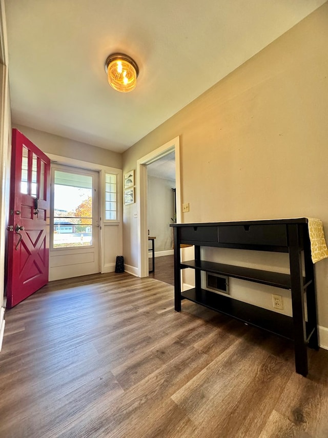 entrance foyer featuring dark hardwood / wood-style floors