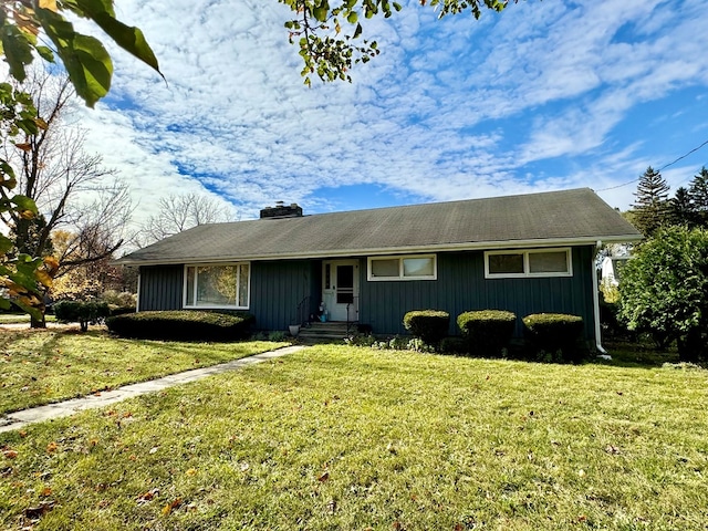 ranch-style home with a front yard