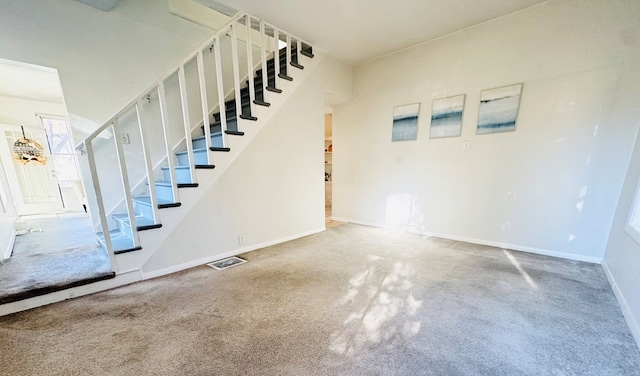 basement featuring carpet flooring