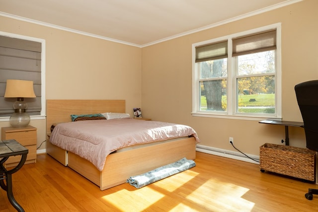 bedroom with wood-type flooring, ornamental molding, and a baseboard radiator