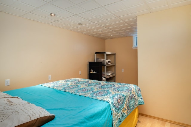 bedroom featuring wood-type flooring