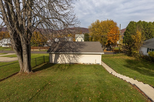 view of home's exterior with a lawn