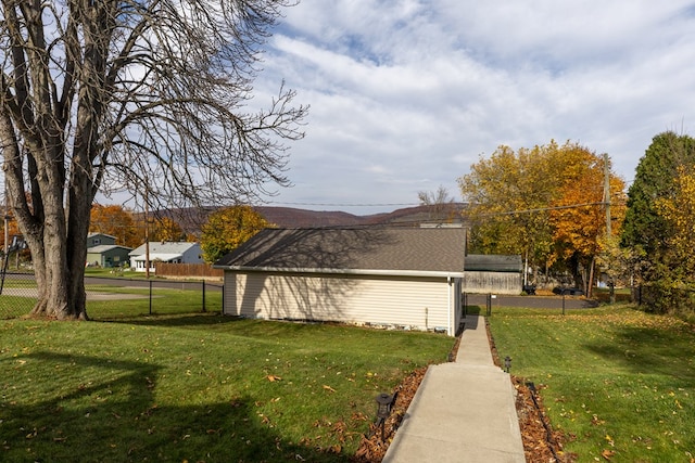 view of home's exterior featuring a lawn