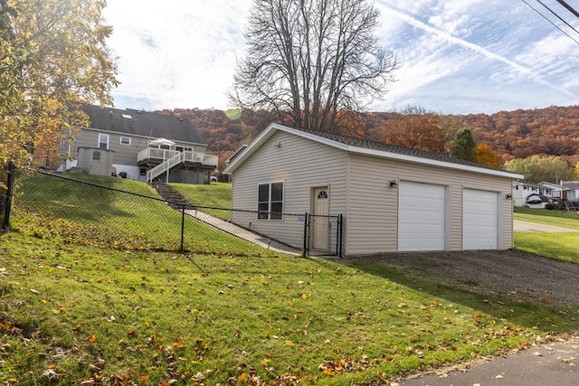 garage with a yard