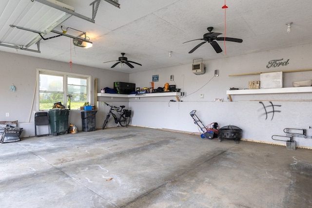 garage with ceiling fan and a garage door opener