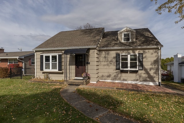 view of front facade with a front yard