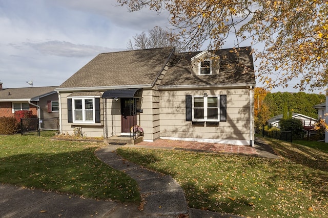 view of front of home featuring a front lawn