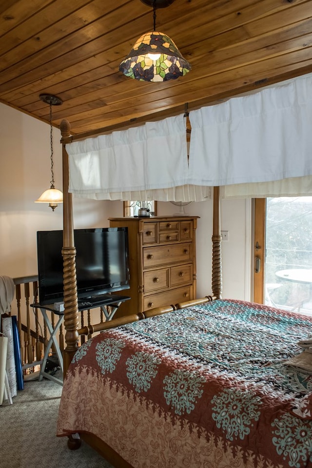 bedroom with carpet and wooden ceiling