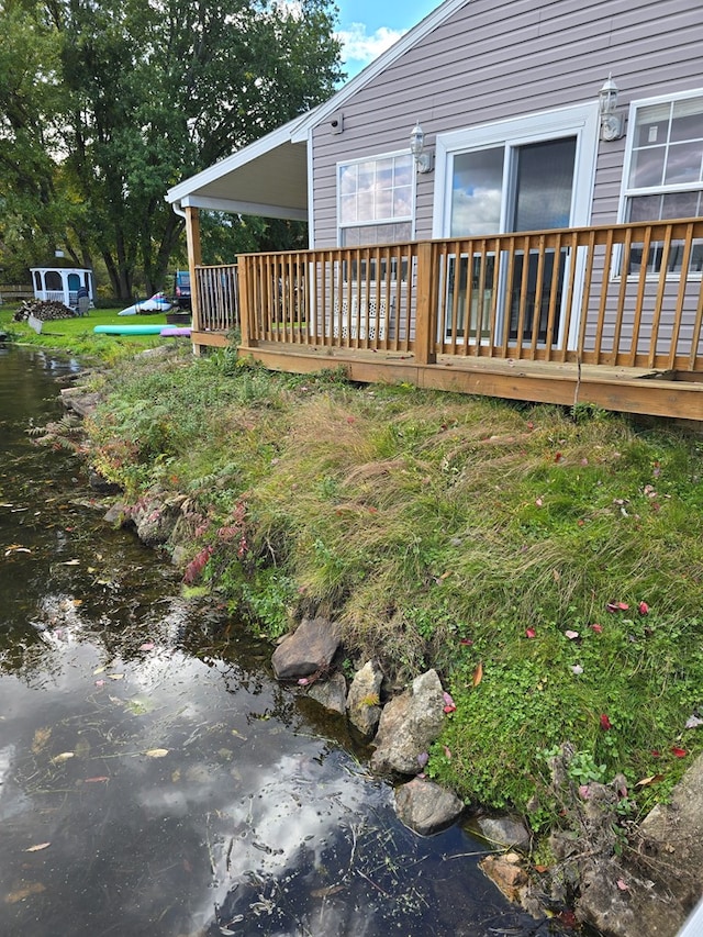 view of yard with a wooden deck