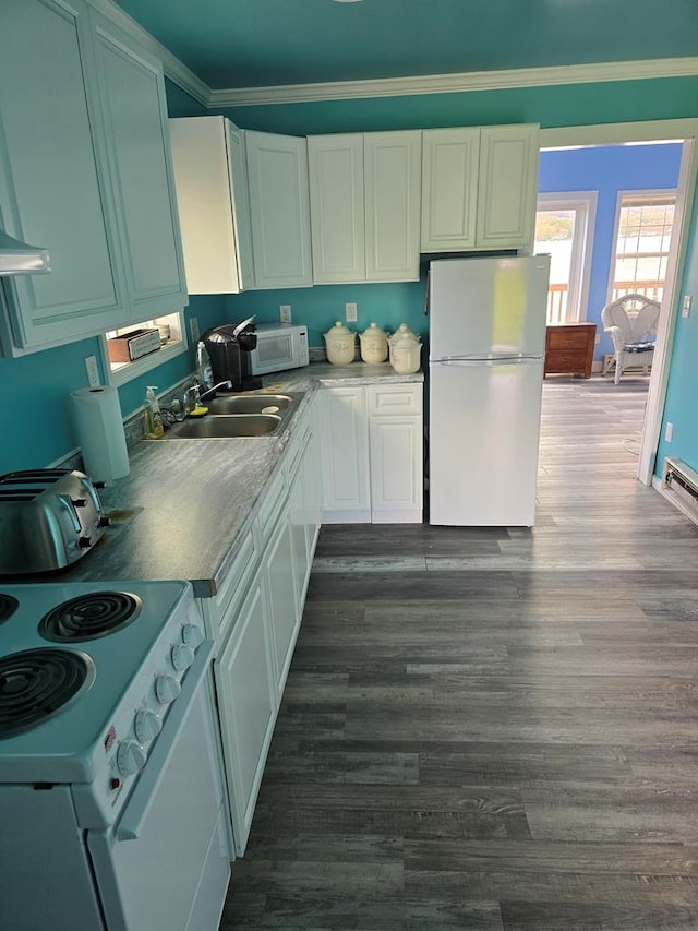 kitchen with white appliances, ornamental molding, dark hardwood / wood-style floors, white cabinets, and sink