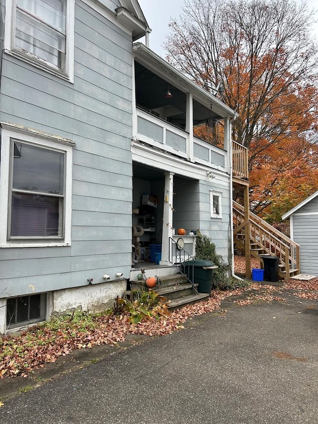 view of property exterior with a balcony