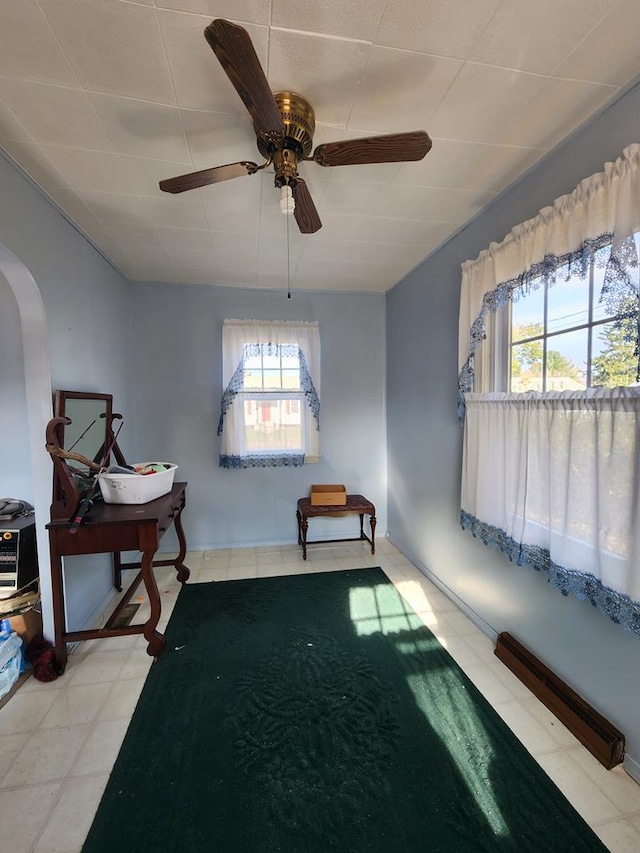 misc room with ceiling fan