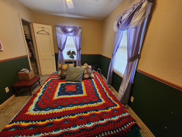 bedroom featuring carpet and ceiling fan