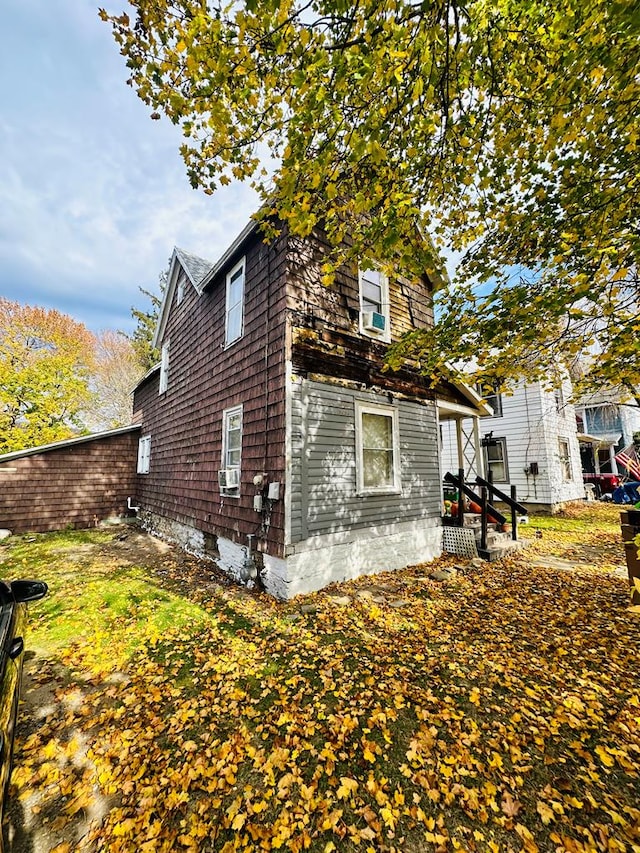 view of property exterior with cooling unit