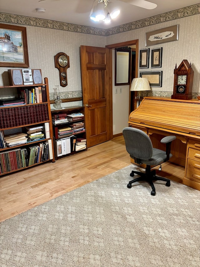 office space with ceiling fan and hardwood / wood-style floors